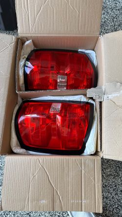 Right and left rear tail lights for 2016 through 2019 Chevy Silverado 1500 LT.