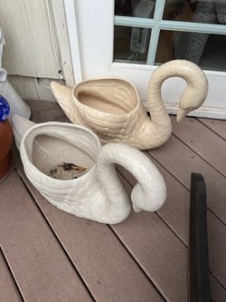 2 Swan plant holders