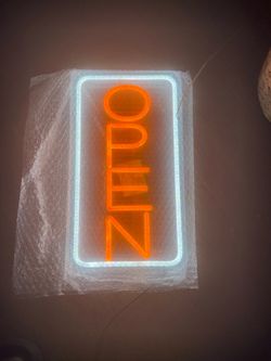 OPEN vertical neon sign