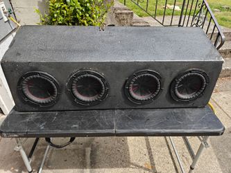 4 Kicker 8's in custom ported box. BIG BASS