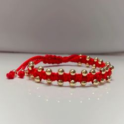 Rakhi Bracelet Red String with 14k Gold plated beads.