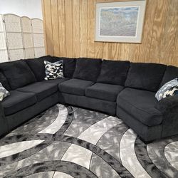 Ashley Furniture Sectional with Cuddler Corner end.
Delivery options available!