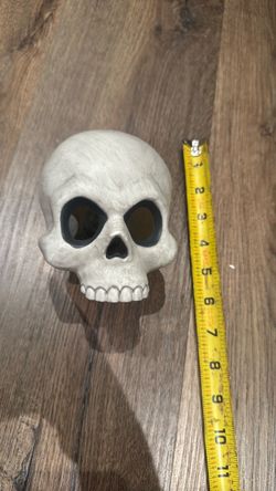 Battery operated light up decorative skull