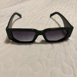 Prada PR 17WS “Symbole” sunglasses, specifically the Verde (green) version.