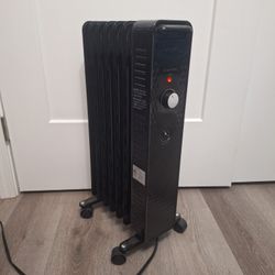 Mainstays 1500W Oil Filled Electric Radiator Space Heater with Wheels Adjustable Temperature 