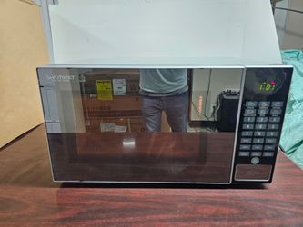 Simply Perfect For The Home  Countertop Microwave Oven.