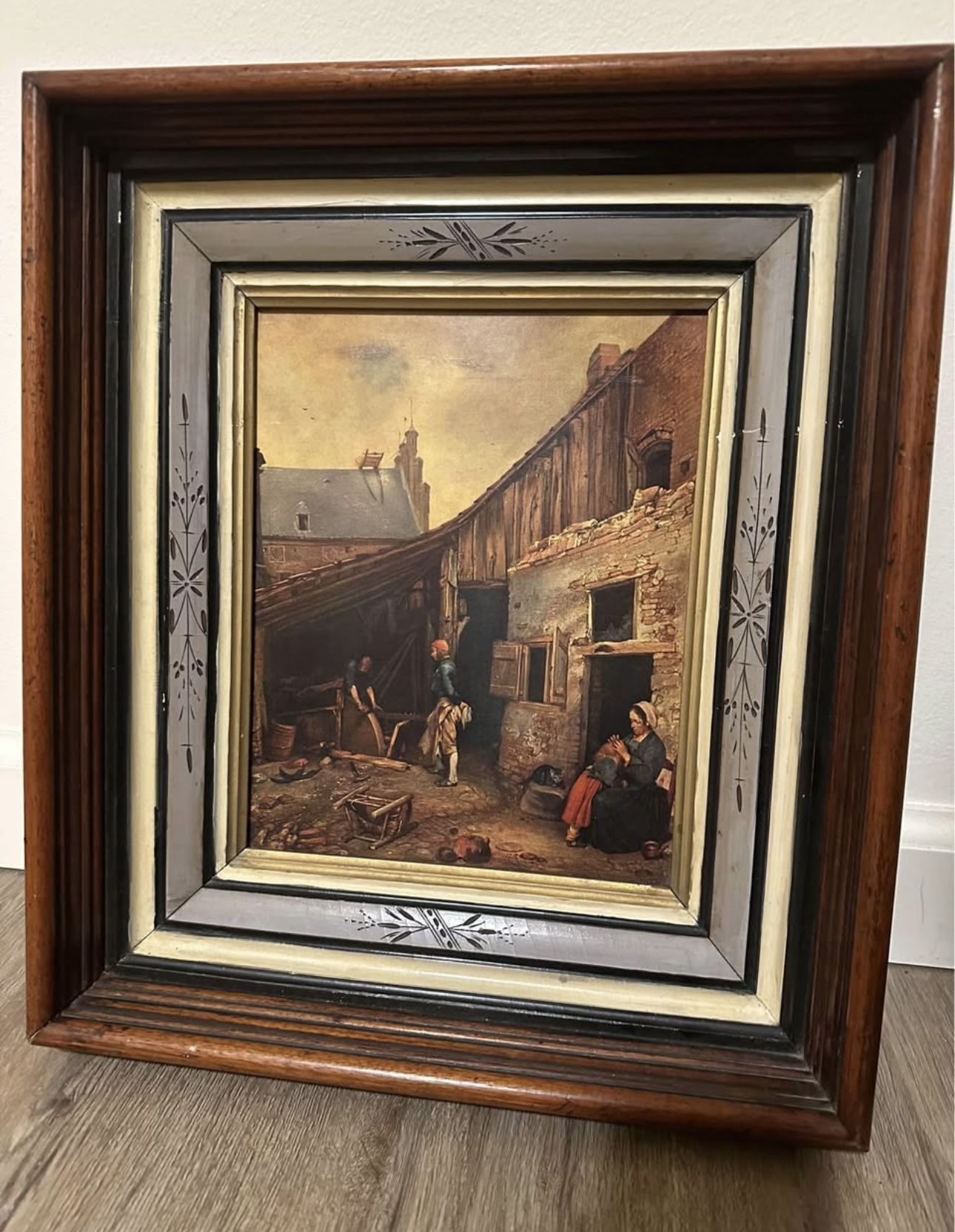 Gerard tee borch’s “The grinder’s family” framed print