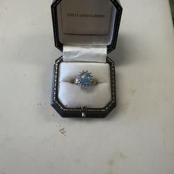 Woman’s Opal And Diamond Ring 