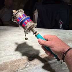 Tibetan prayer scrolls hand wheel