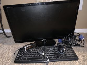 Computer screen, keyboard, mouse and working either net.