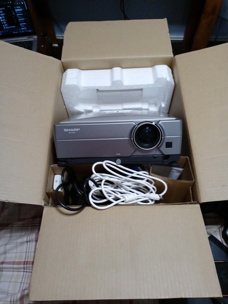 Note vision Projector SHARP XG-C335X