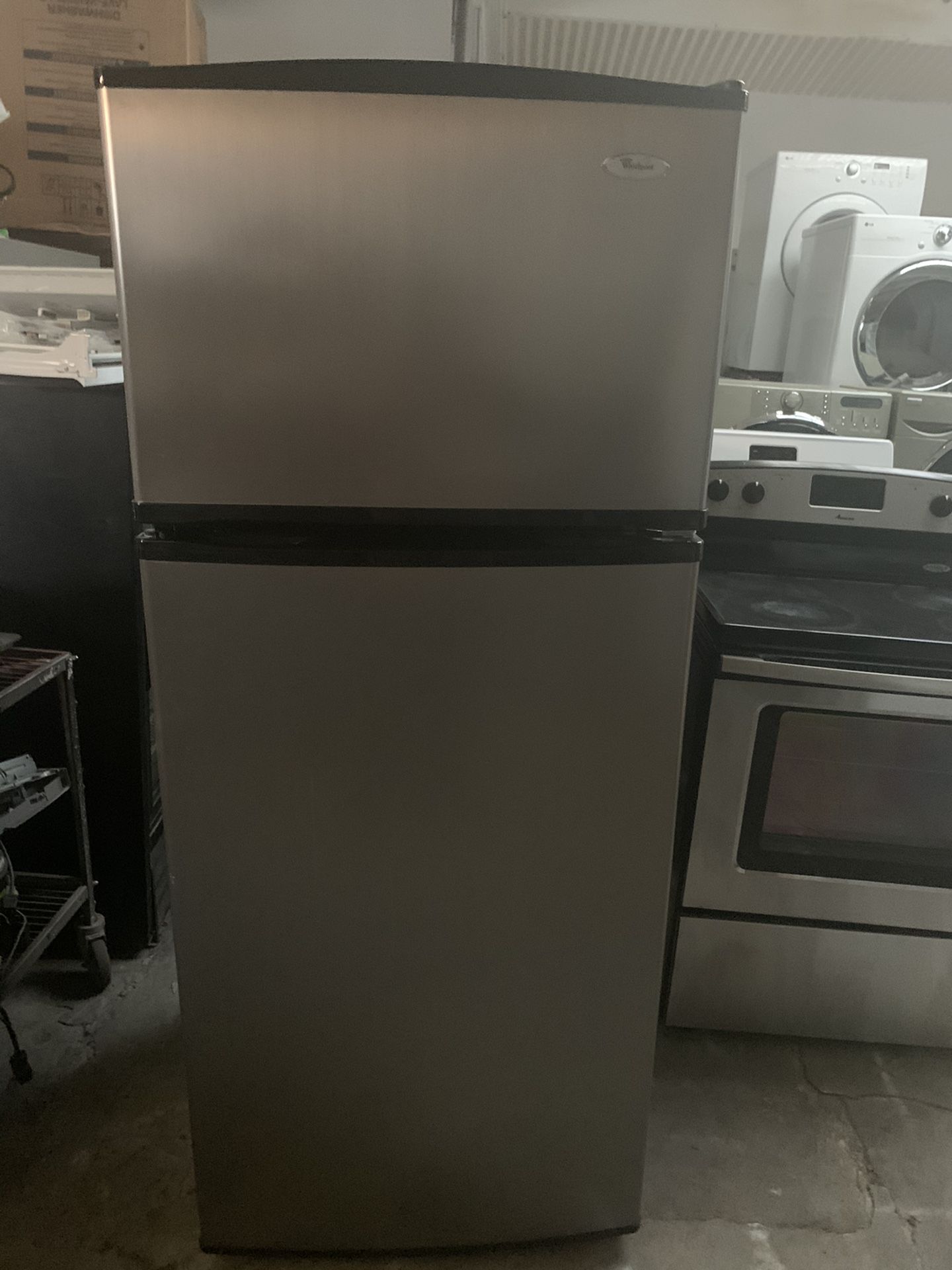Refrigerator brand whirlpool everything is good working condition 90 days warranty delivery and installation