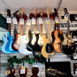 ELECTRIC AND ACOUSTIC GUITARS (PRICE IS INDIVUDUAL)