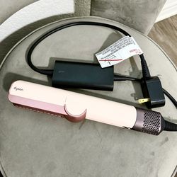 Pink Dyson Airstrait