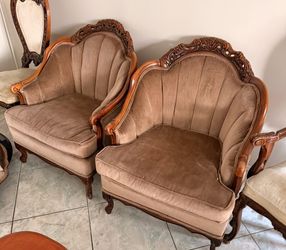 Vintage French Provincial Louis XV style carved wood upholstered armchairs.