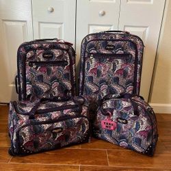 4 Piece Kathy Van Zeeland Luggage (Used once)
