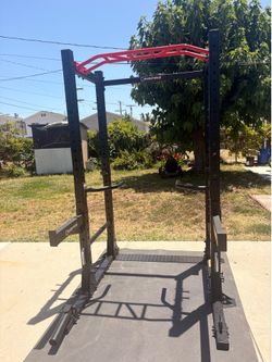 Inspired power cage in like new condition has dips land mine and rope attachments   And 2 different sets of safety bars one set of J hooks  pick up in