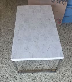 White and grey Marble cocktail with a side table