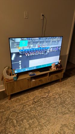 55 inch Roku TV with tv stand