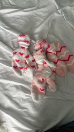 Socks three pairs never used. Size 6 and up