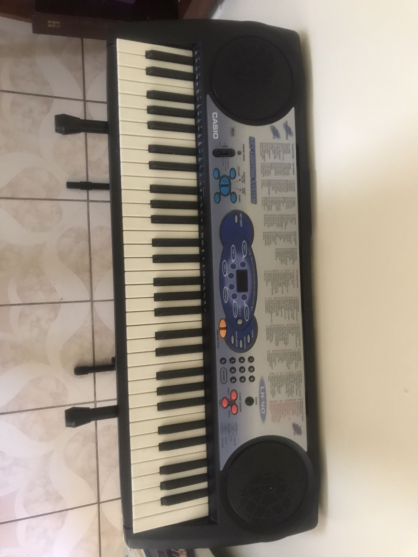 Casio piano keyboard w/ stand