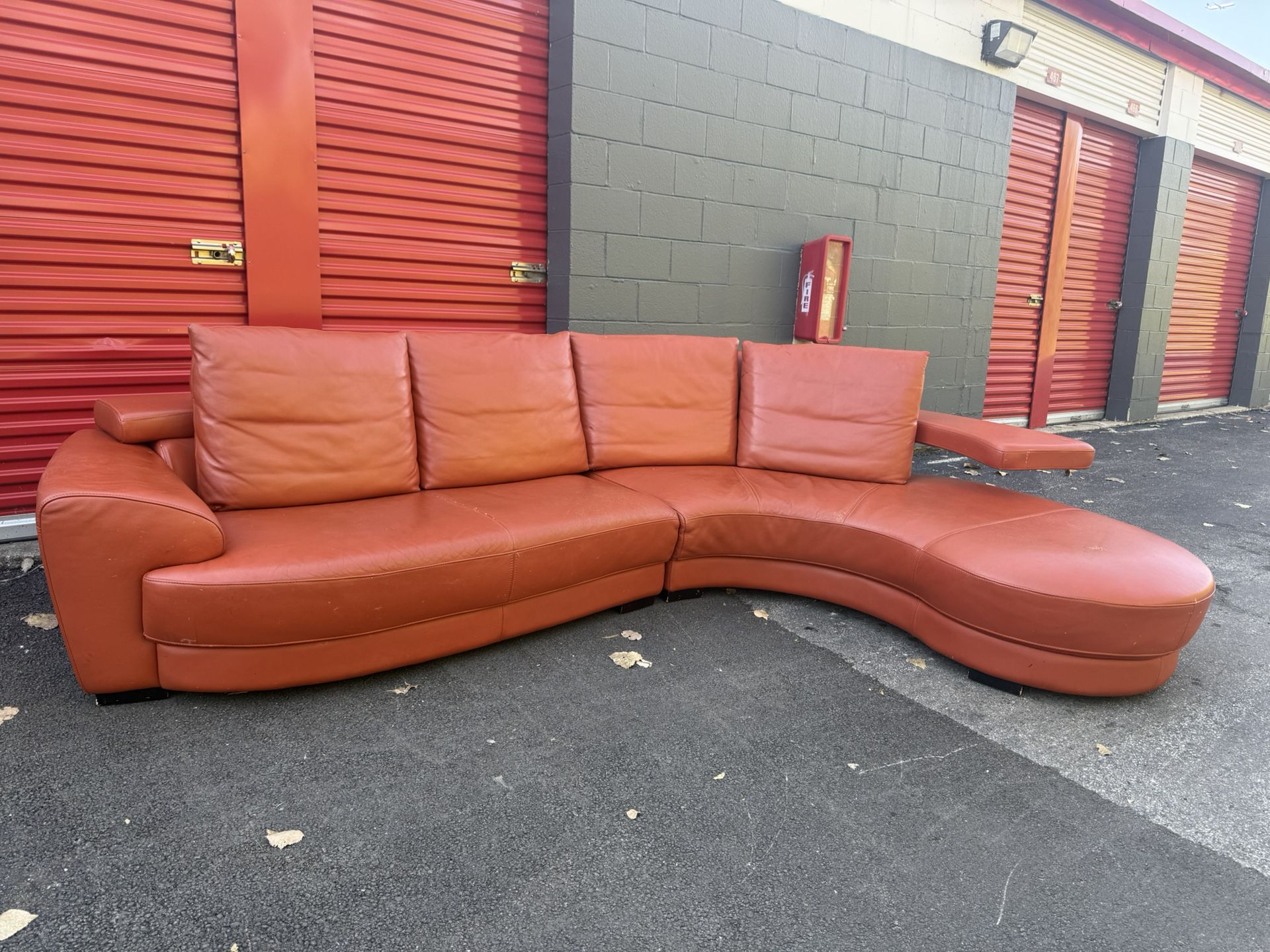Modern Curved Orange Leather Sectional Couch! ***Free Curbside Delivery***