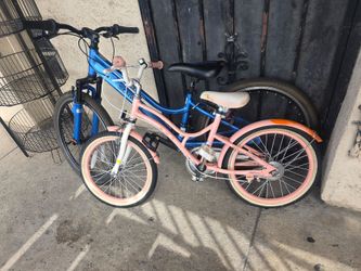 The tires of the blue bike are missing air
