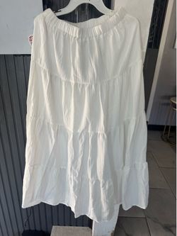 Medium size long white skirt for women