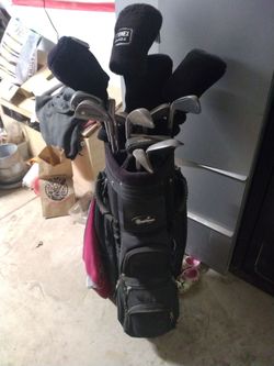 Golf clubs balls and tees