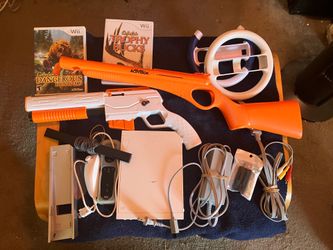 Wii with Hunting Games, Guns, and Wheels