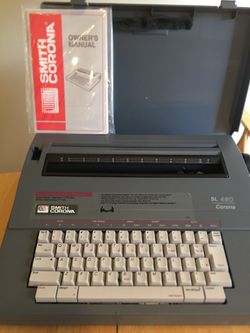 Vintage Smith Corona SL480 Portable Electric Typewriter with Owner’s Manual