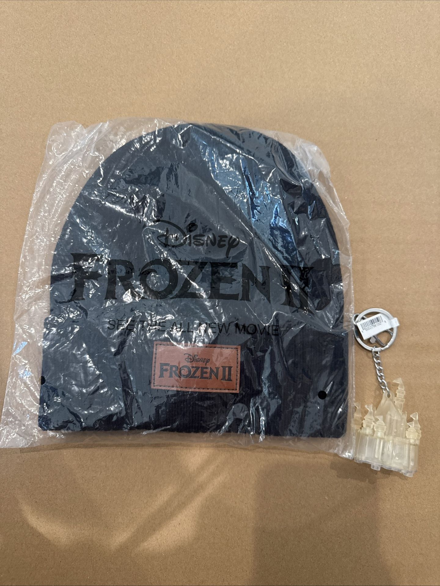 Disney Frozen II Black Beanie Hat And Light Up Castle Keychain 