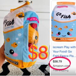 $8 Like new Go Fish Packaging Fleece Plushy/ Pillow