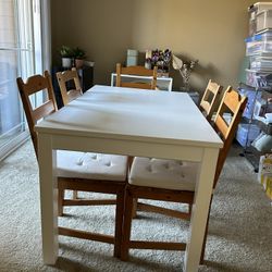 Extendable Dining Table, Chairs And Chair Cushions