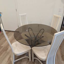 Round Smoke Glass Table  W/ 4 White Leather Chairs $75 OBO