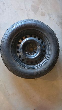 All Terrain Tire in Steel Wheel, 245/65 R17, New.