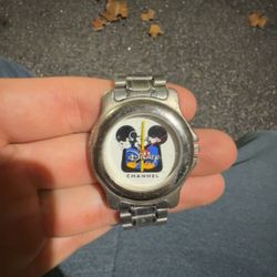 vintage Disney Channel Mickey Mouse quartz watch with a silver-tone stainless steel link band