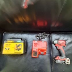 Milwauki M18 impact driver and charger and a Dewalt self leveling  Laser.  $130.00