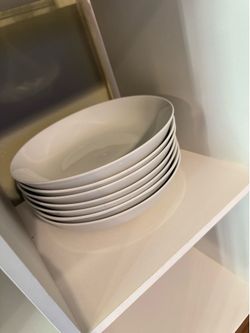 7 Ceramic Cereal Bowls & 1 small plate