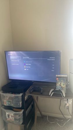 Ps5 digital 1TB w/ 32in TV, 2 Controllers and 2 games