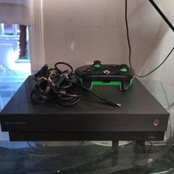 X Box One X 1tb AND Rockband 4 Equipment (No Disc/game)