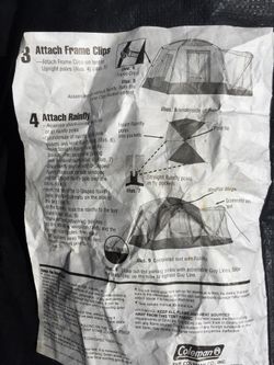 Coleman tent for 4 standing within and picnic net area