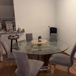 Big Round Glass Table With 6 Suede Chairs 