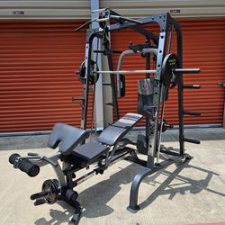 PLEASE READ DESCRIPTION BELOW.  Marcy Smith Machine  Home Gym  w/  Weights  DELIVERY AVAIL. FIRM PRICE.