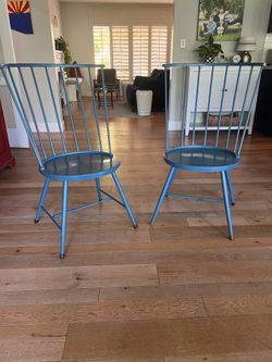 Blue metal dining chairs.