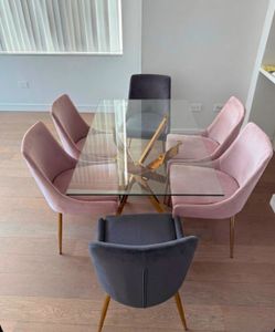 Glass dining table with gold base and 6 velvet chairs