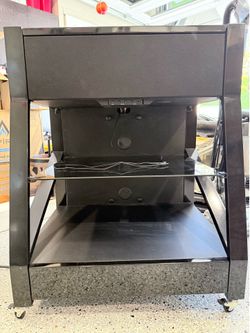 Media rack built in speakers and amp projector setup