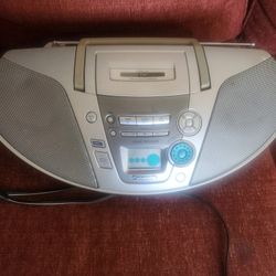 Portable Stereo System.  ((Panasonic _ ES20))  Caset  Radio   CD.