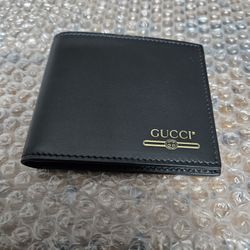 Gucci Gold Logo Bifold Black Leather Wallet