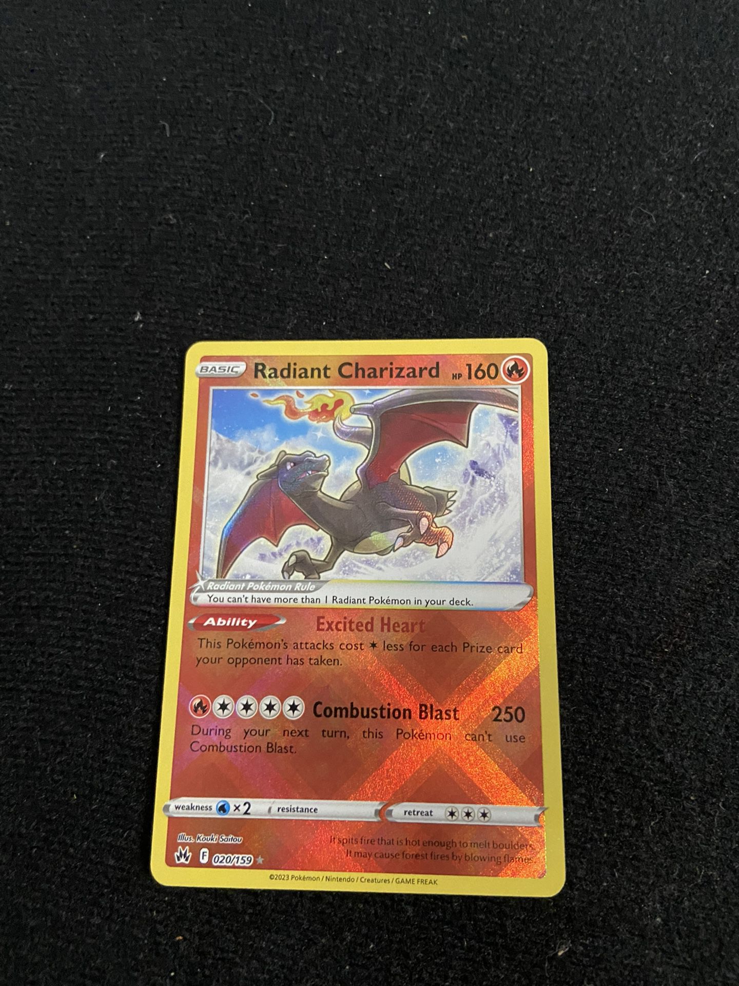 A Radiant Charizard holo too in pretty good condition 